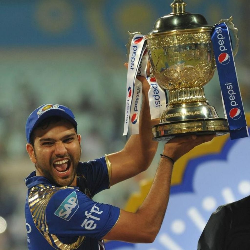 Rohit Sharma lifting ipl trophy after the win of Mumbai Indians 